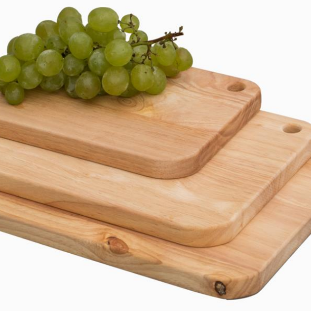 Natural rubber wood chopping board with round holes